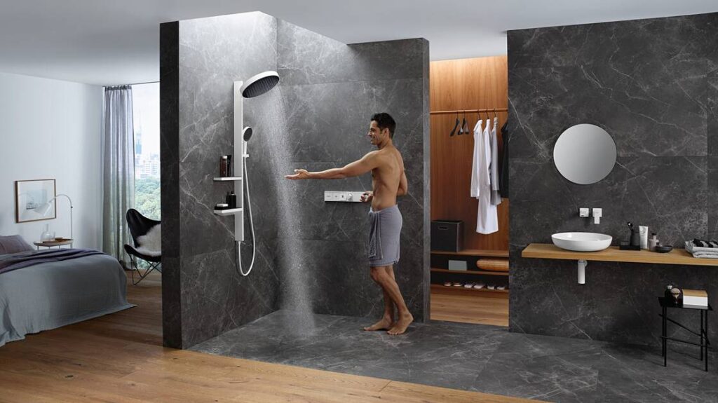 rainfinity showerpipe bathroom with male model ambiance 16x9